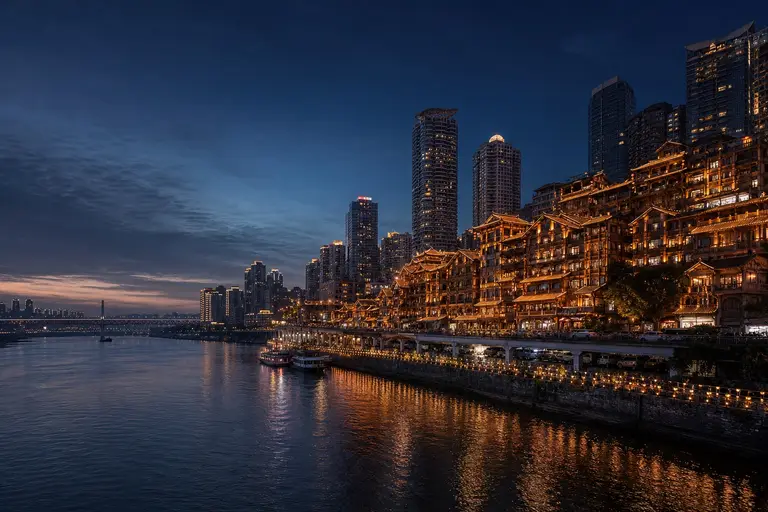 Chongqing's layered riverside skyline after dark